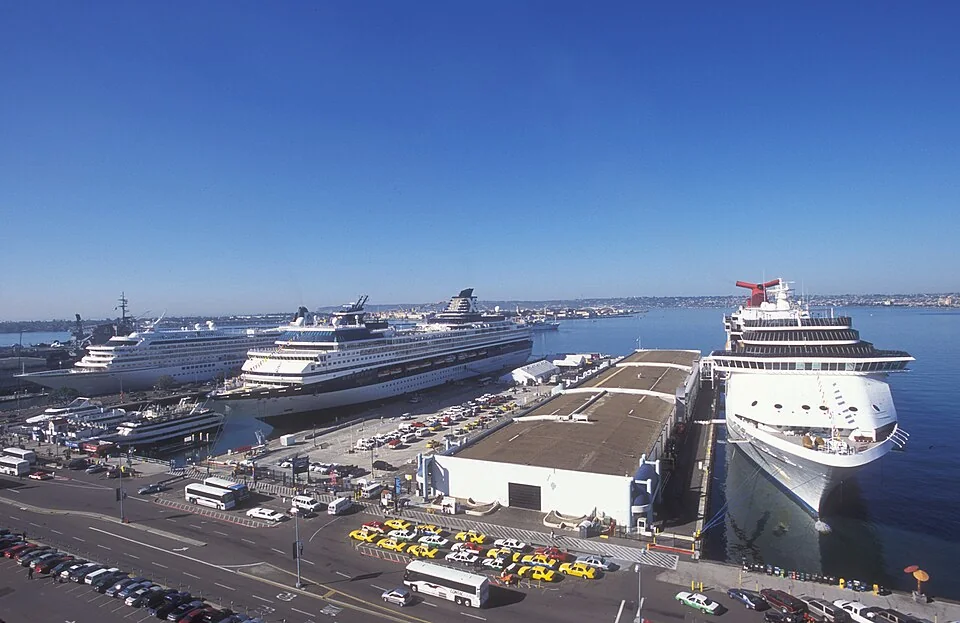 Cruise ships alongside B Street Cruise Terminal and the waterfront passenger pickup area in San Diego