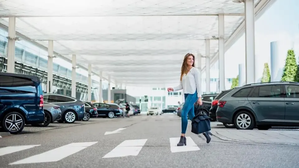 Traveler using airport parking transfer